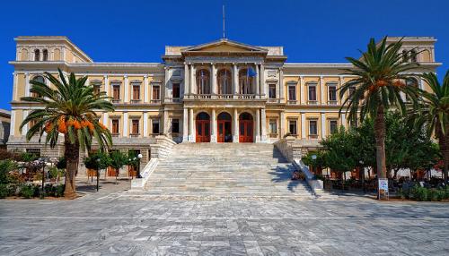 Decoration by Ilias Bountouris for restoration and coloring of a Syros island City Hall facade, Greece